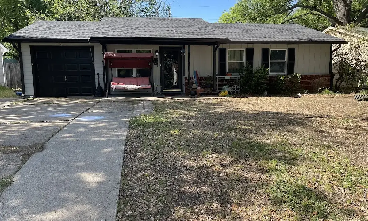 Asphalt Shingle Roof Repair crew at work on a residential roof in Rainbow Springs